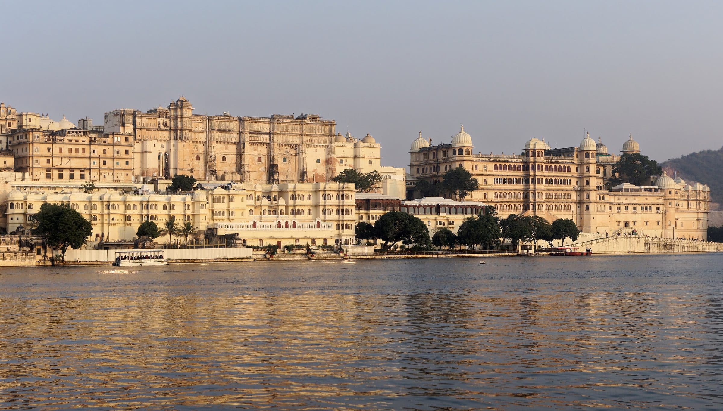 The City Palace in golden light on Lake Pichola